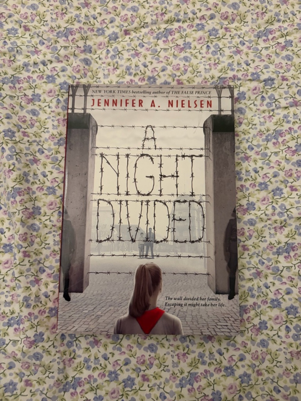 A Night Divided by Jennifer A. Nielsen - Hardcover Book, Red Accent